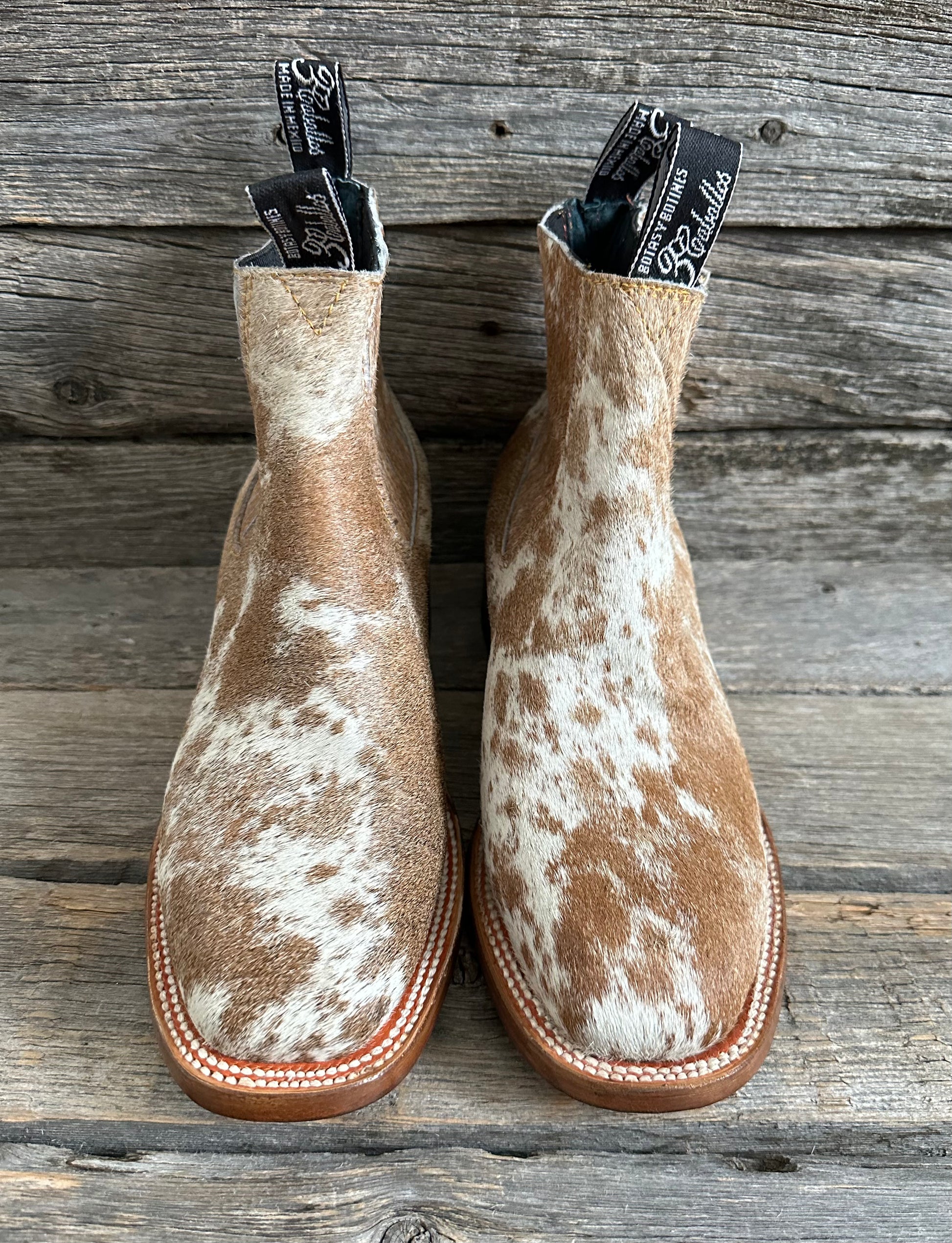 Cowhide boots discount