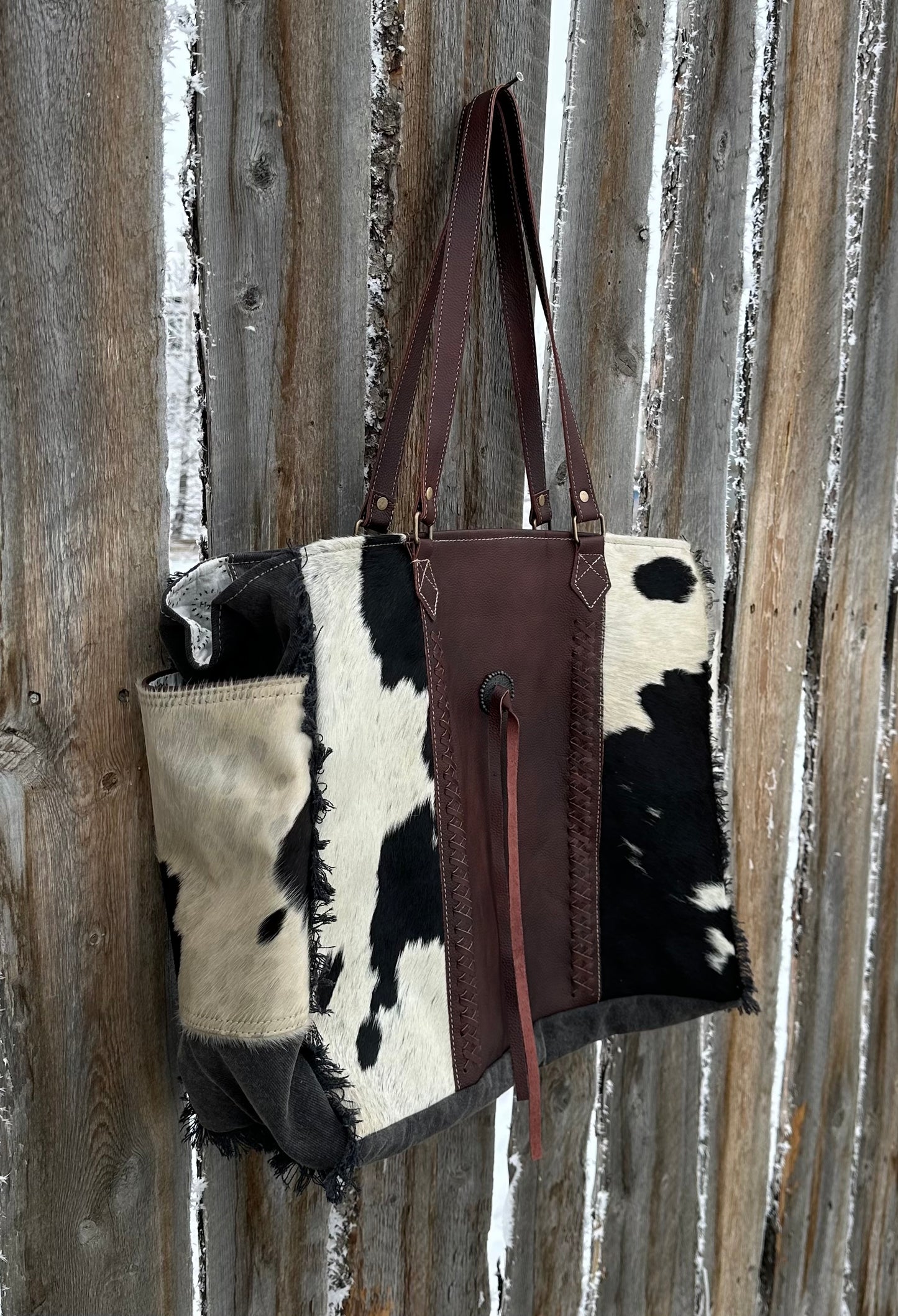 Black & White Cowhide Cross Stitched Weekender Bag
