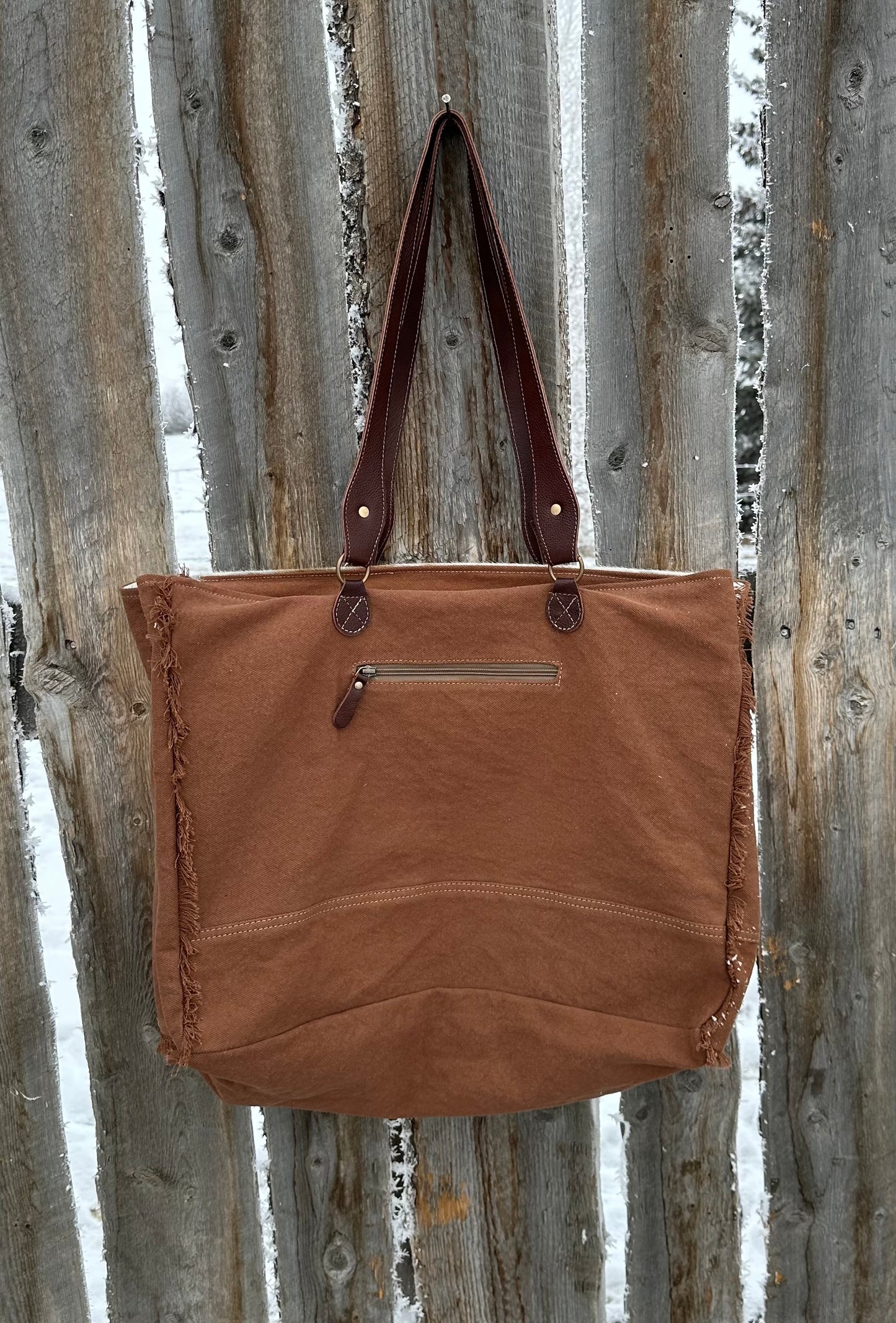 Brown & White Cowhide Turquoise Embossed Leather Weekender Bag
