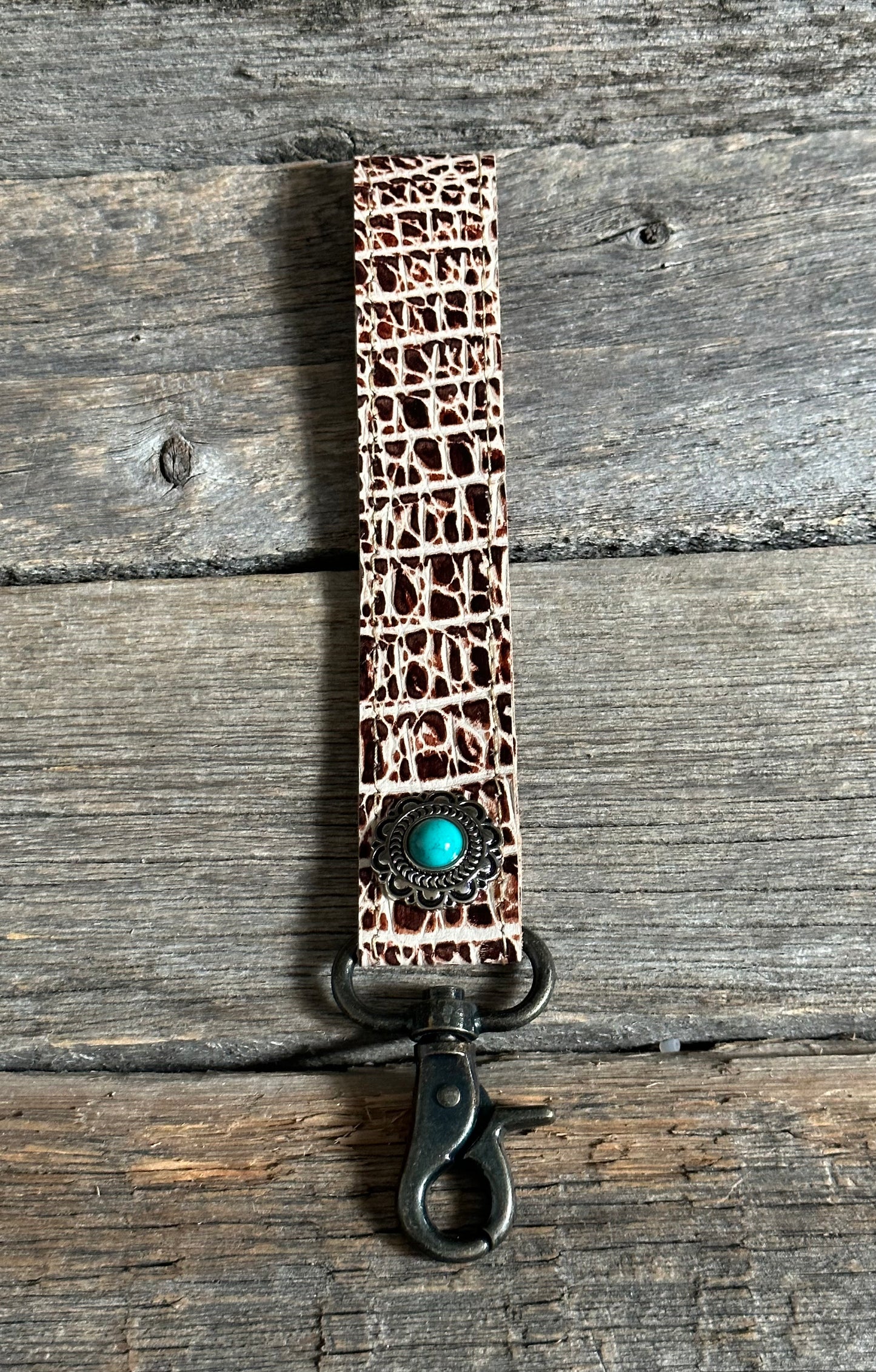 Ivory Embossed Leather Wristlet